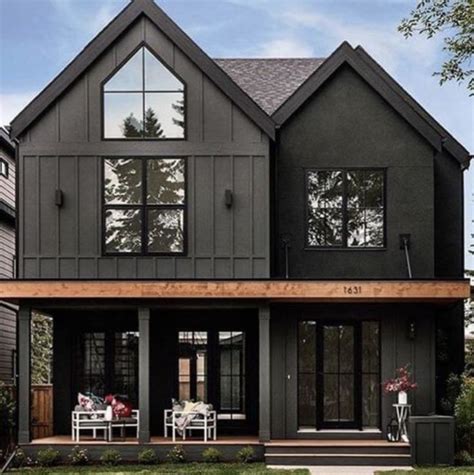 black metal decorations on exterior of house|black house ideas.